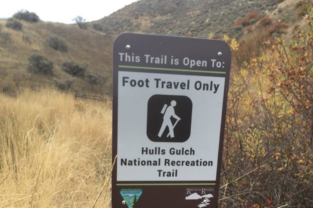 Foot travel only sign at trailhead.
